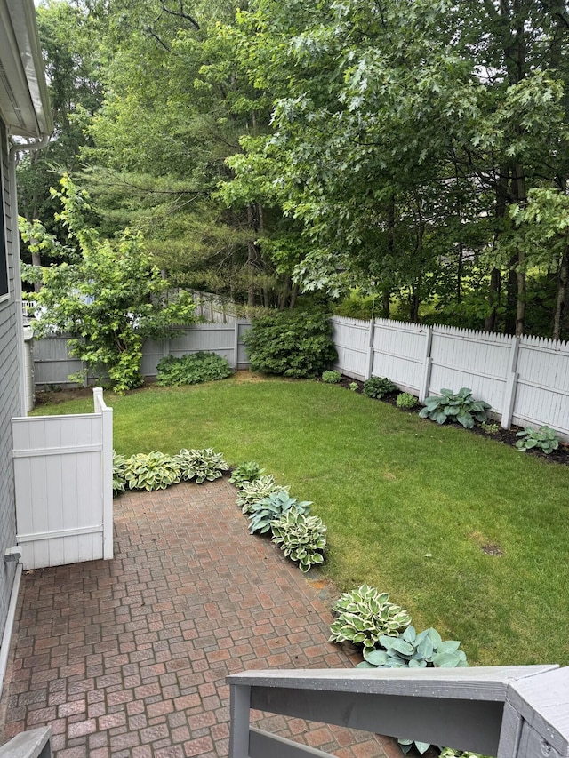 30 Date St, Old Orchard Beach, ME 04064 - fenced backyard with a patio area