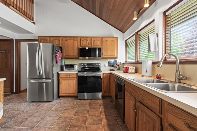 2 Flynn Rd, Raymond, ME 04071 - kitchen featuring appliances with stainless steel finishes, a sink, wood ceiling, light countertops, and brown cabinets
