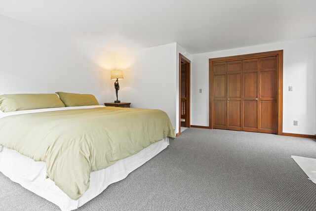 2 Flynn Rd, Raymond, ME 04071 - carpeted bedroom with a closet and baseboards
