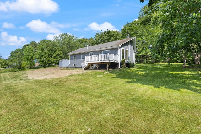 142 Hacker Rd, Brunswick, ME 04011 - back of house featuring a deck, a lawn, stairway, and view of scattered trees