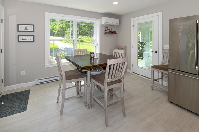 7 Elysian Way, Bridgton, ME 04009 - dining area with a baseboard radiator, an AC wall unit, light wood-style flooring, recessed lighting, and baseboards