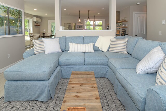7 Elysian Way, Bridgton, ME 04009 - living room with a wall unit AC and recessed lighting