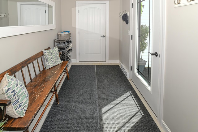 7 Elysian Way, Bridgton, ME 04009 - entrance foyer featuring baseboards and dark carpet