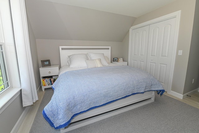 7 Elysian Way, Bridgton, ME 04009 - bedroom featuring lofted ceiling, a closet, and baseboards