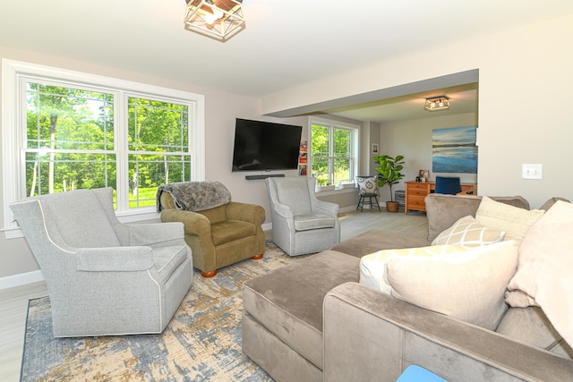 7 Elysian Way, Bridgton, ME 04009 - living area featuring baseboards and wood finished floors