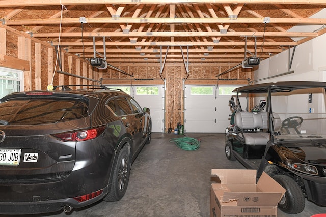 7 Elysian Way, Bridgton, ME 04009 - garage featuring a garage door opener