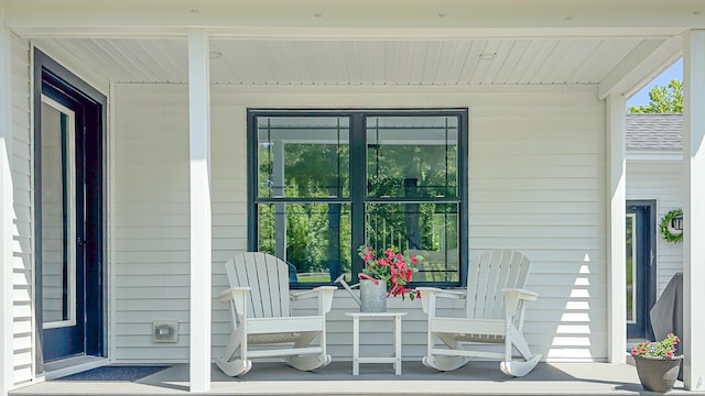 7 Elysian Way, Bridgton, ME 04009 - doorway to property featuring a porch