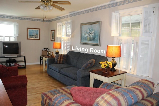 225 Webber Ave, Lewiston, ME 04240 - living area with wood finished floors and a ceiling fan