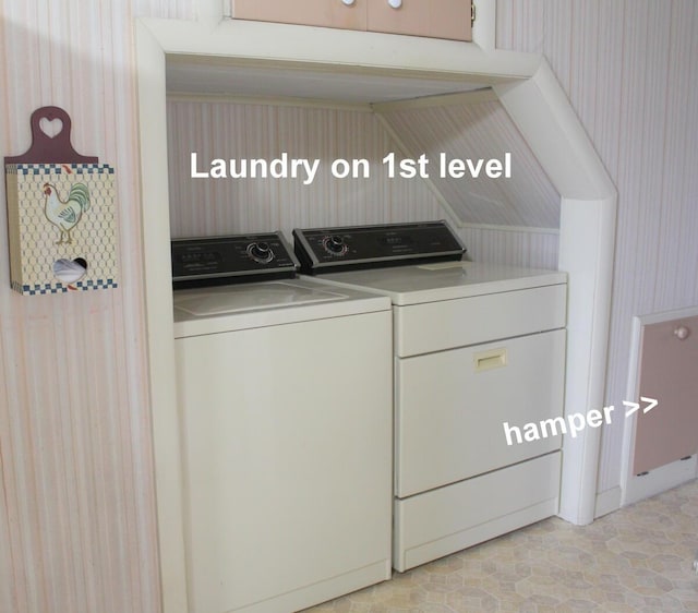 225 Webber Ave, Lewiston, ME 04240 - laundry area with washer and dryer and wallpapered walls