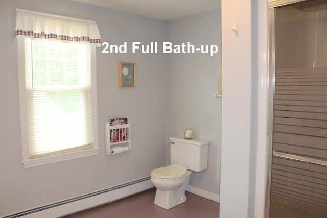 225 Webber Ave, Lewiston, ME 04240 - bathroom featuring a baseboard radiator and a shower with shower door