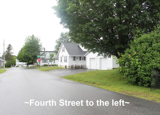 225 Webber Ave, Lewiston, ME 04240 - view of asphalt street featuring traffic signs