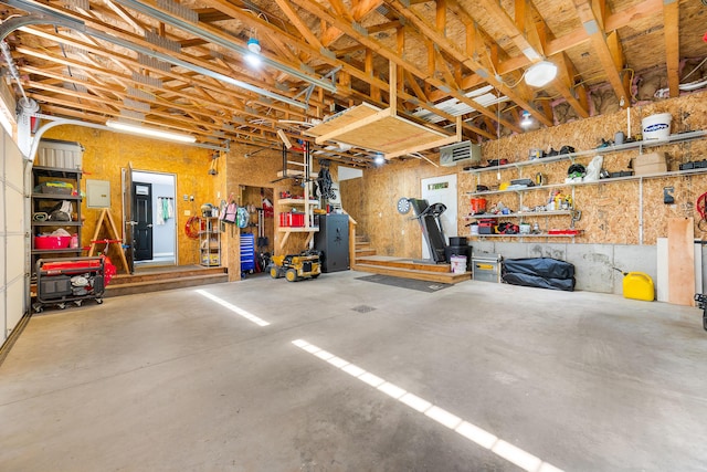 71 Blake Rd, Turner, ME 04282 - garage featuring a workshop area