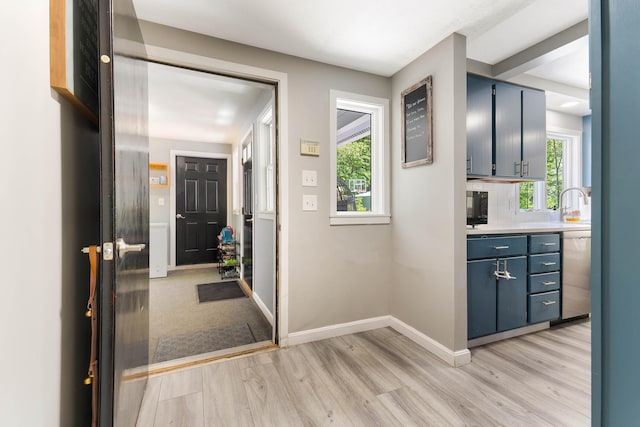 71 Blake Rd, Turner, ME 04282 - foyer featuring light wood finished floors and baseboards