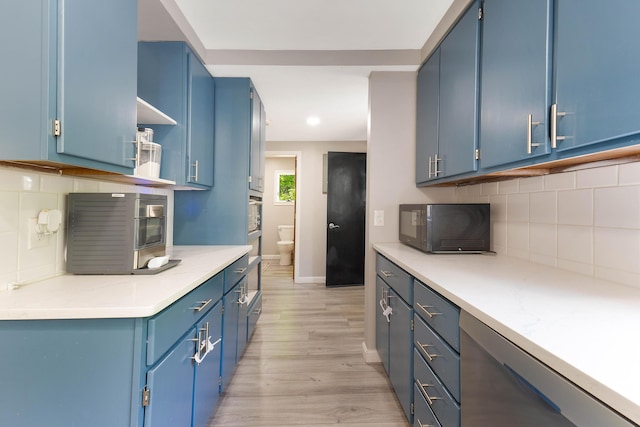 71 Blake Rd, Turner, ME 04282 - kitchen with blue cabinets and recessed lighting