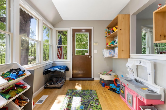 71 Blake Rd, Turner, ME 04282 - rec room with wood-type flooring, lofted ceiling, and baseboards