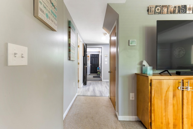 71 Blake Rd, Turner, ME 04282 - corridor featuring baseboards and light colored carpet