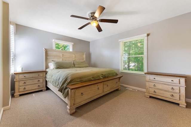 71 Blake Rd, Turner, ME 04282 - bedroom with light colored carpet, baseboards, and a ceiling fan
