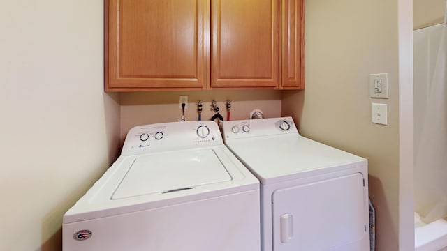 168 W Tucker Ridge Rd, Springfield, ME 04487 - washroom with washer and clothes dryer and cabinet space