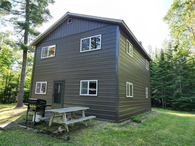 168 W Tucker Ridge Rd, Springfield, ME 04487 - back of house with a lawn