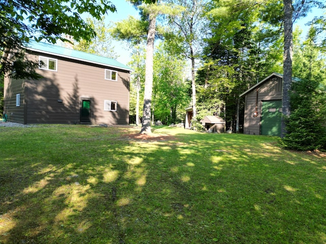 168 W Tucker Ridge Rd, Springfield, ME 04487 - view of grassy yard with an outdoor structure