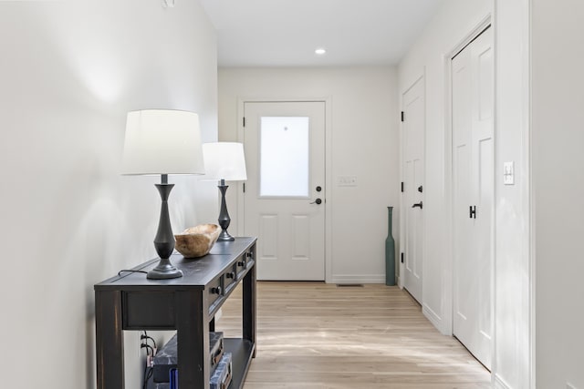 25 Royale Dr, Sidney, ME 04330 - doorway featuring light wood-style flooring, recessed lighting, and baseboards
