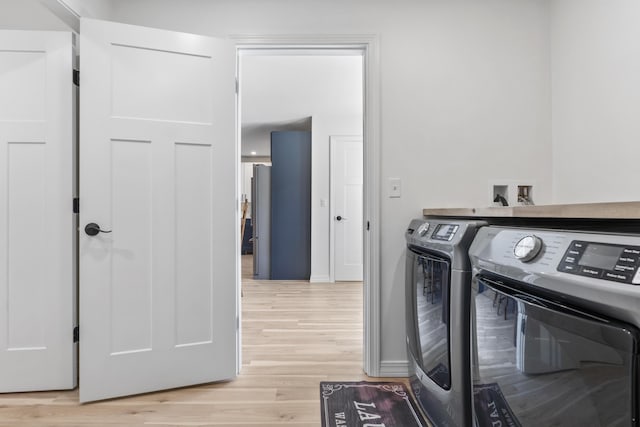 25 Royale Dr, Sidney, ME 04330 - laundry area with washing machine and dryer and light wood finished floors