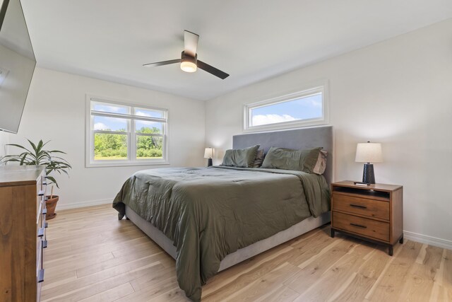 25 Royale Dr, Sidney, ME 04330 - bedroom featuring baseboards, light wood-style floors, and a ceiling fan