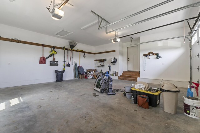 25 Royale Dr, Sidney, ME 04330 - garage with a garage door opener