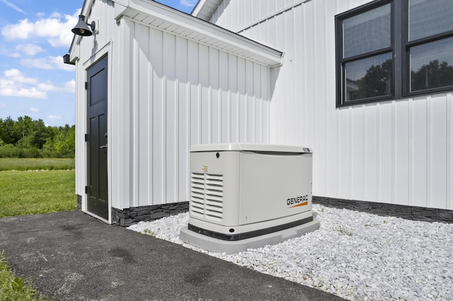 25 Royale Dr, Sidney, ME 04330 - exterior view of a power unit and board and batten siding