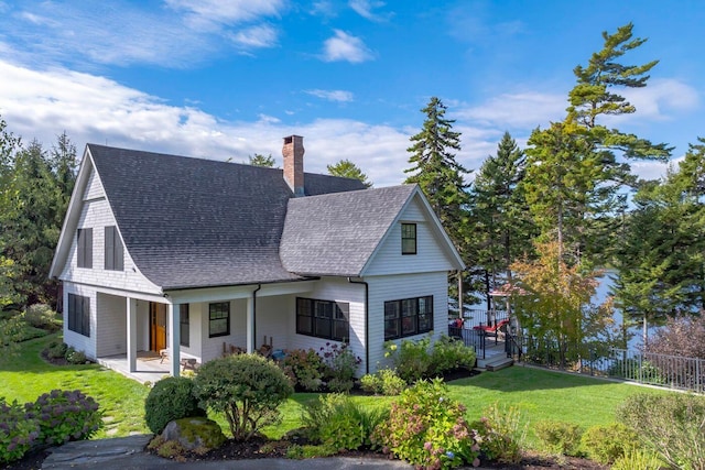 19 Vista Way, Mount Desert, ME 04660 - view of front of property featuring a chimney, a shingled roof, and a porch