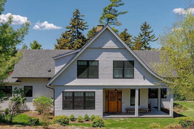19 Vista Way, Mount Desert, ME 04660 - view of front of house with a chimney, a porch, and roof with shingles