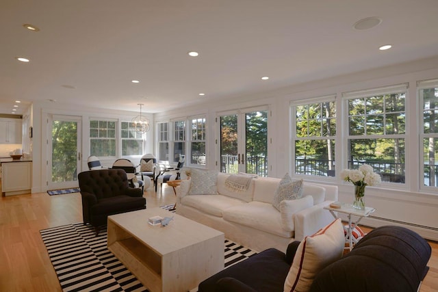 19 Vista Way, Mount Desert, ME 04660 - living area with plenty of natural light, light wood-type flooring, a chandelier, recessed lighting, and a baseboard radiator