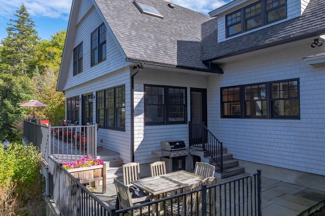 19 Vista Way, Mount Desert, ME 04660 - rear view of property with outdoor dining space, a shingled roof, and a patio area