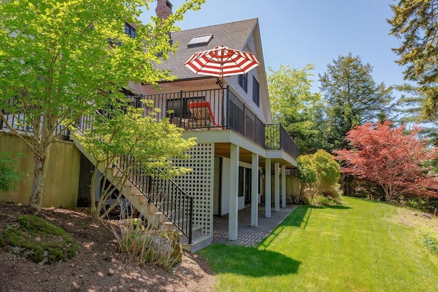 19 Vista Way, Mount Desert, ME 04660 - back of house featuring a shingled roof, a deck, stairway, and a chimney