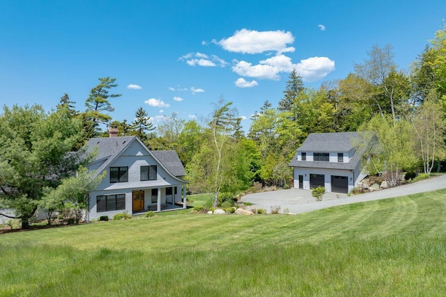 19 Vista Way, Mount Desert, ME 04660 - view of grassy yard with covered porch, an attached garage, and concrete driveway