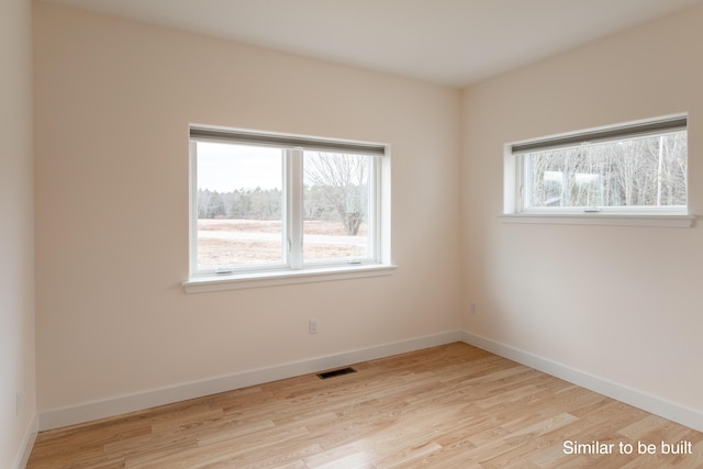 4 Windward Rdg, Biddeford, ME 04005 - empty room featuring wood finished floors and baseboards