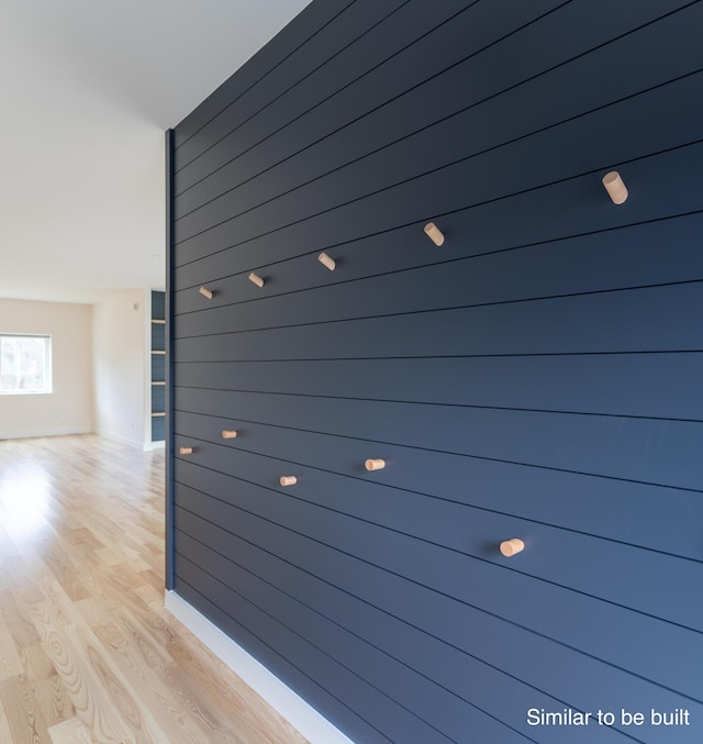 4 Windward Rdg, Biddeford, ME 04005 - hallway with light wood-style flooring and baseboards