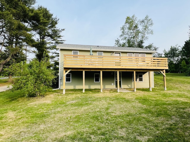 23 Ichabod Ln, Hampden, ME 04444 - back of property featuring a wooden deck and a yard