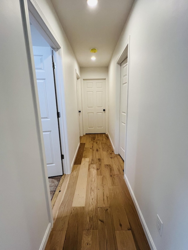 23 Ichabod Ln, Hampden, ME 04444 - corridor featuring wood finished floors and baseboards