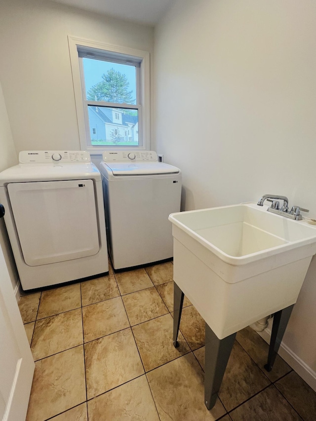 23 Ichabod Ln, Hampden, ME 04444 - laundry room with washing machine and dryer and light tile patterned flooring