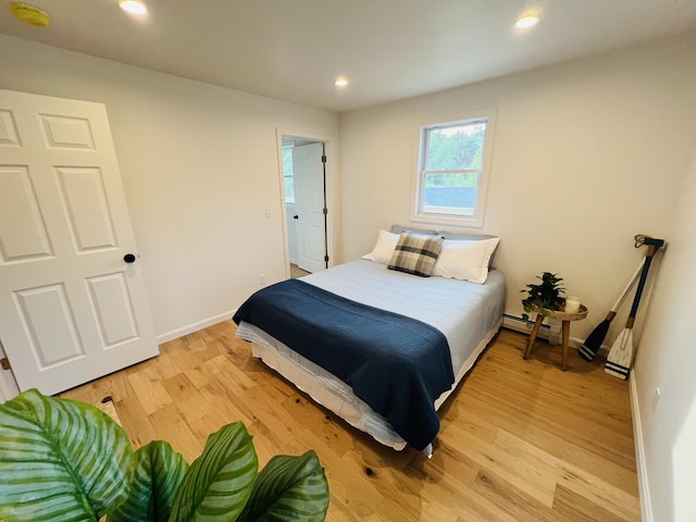 23 Ichabod Ln, Hampden, ME 04444 - bedroom featuring light wood finished floors, baseboards, baseboard heating, and recessed lighting