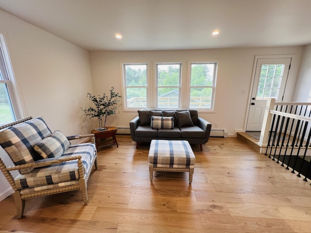 23 Ichabod Ln, Hampden, ME 04444 - living area featuring light wood-style flooring, baseboard heating, recessed lighting, and baseboards