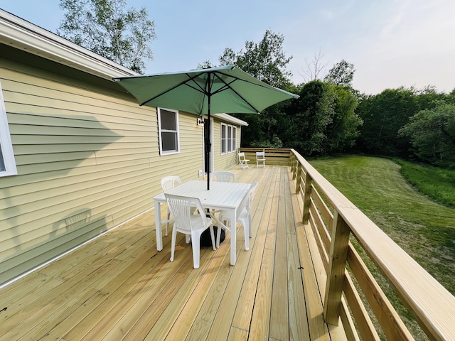 23 Ichabod Ln, Hampden, ME 04444 - deck featuring outdoor dining space and a lawn