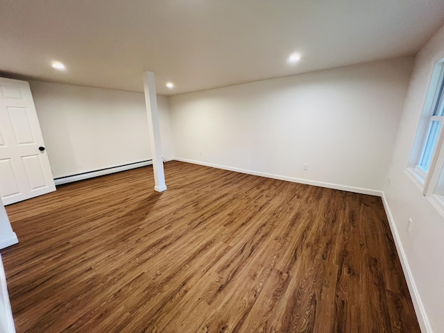 23 Ichabod Ln, Hampden, ME 04444 - finished below grade area featuring a baseboard radiator, wood finished floors, baseboards, and recessed lighting