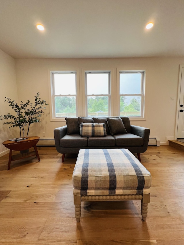 23 Ichabod Ln, Hampden, ME 04444 - living room with a baseboard heating unit, baseboards, light wood finished floors, and recessed lighting