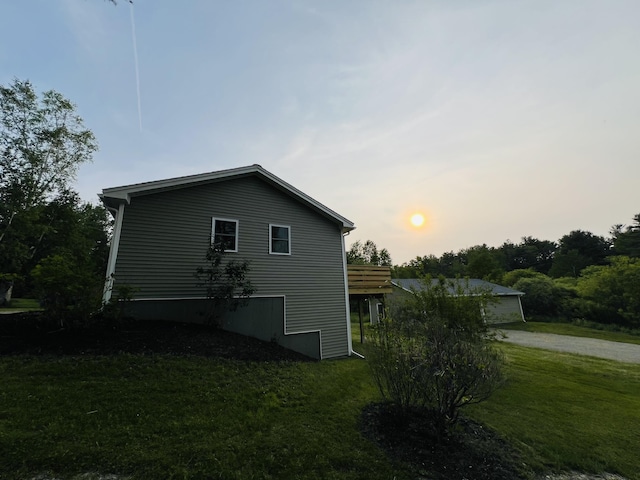 23 Ichabod Ln, Hampden, ME 04444 - view of property exterior with a yard and driveway