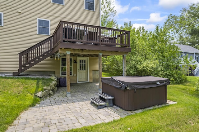 54 Tree Farm Rd, Brunswick, ME 04011 - back of property featuring a hot tub, a deck, a patio area, and a lawn