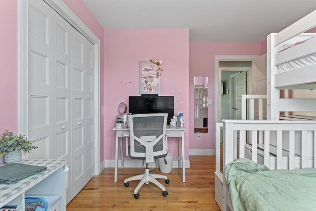 54 Tree Farm Rd, Brunswick, ME 04011 - bedroom with light wood-style floors, a closet, and baseboards