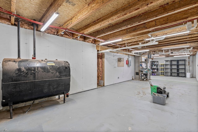 38 Shadagee Rd, Saco, ME 04072 - unfinished basement featuring oil tank