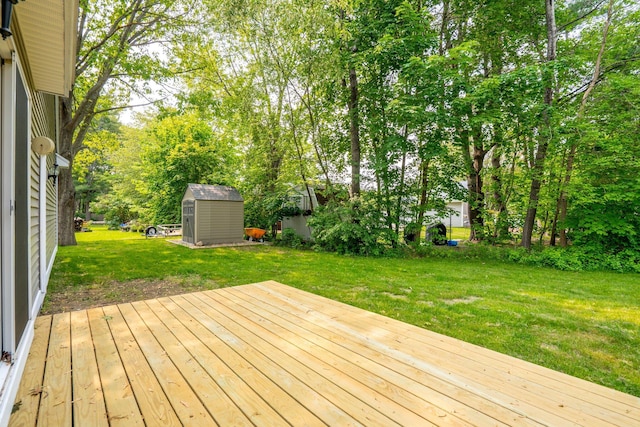 38 Shadagee Rd, Saco, ME 04072 - wooden terrace featuring a lawn and view of scattered trees